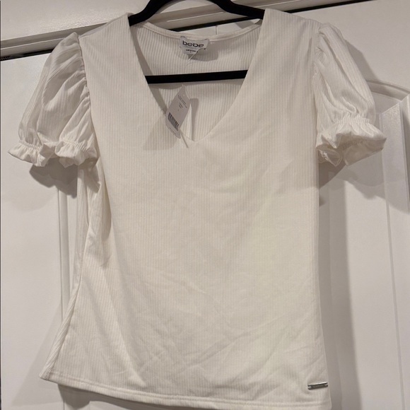 bebe Tops - bebe White Ribbed Puff Sleeve V-Neck Top‎ large nwt